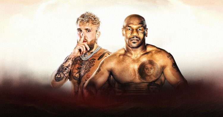 A white backdrop with Jake Paul and Mike Tyson standing in front of it