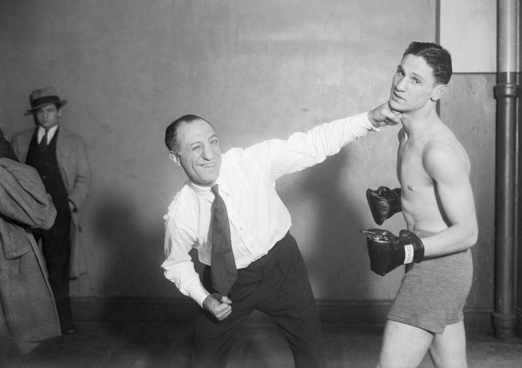 Abe Attell Showing Marty Goldman a Punch