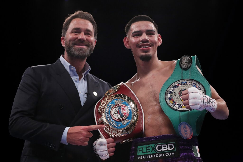 Eddie Hearn poses with rising prospect Diego Pacheco, after his KO win over Jack Cullen