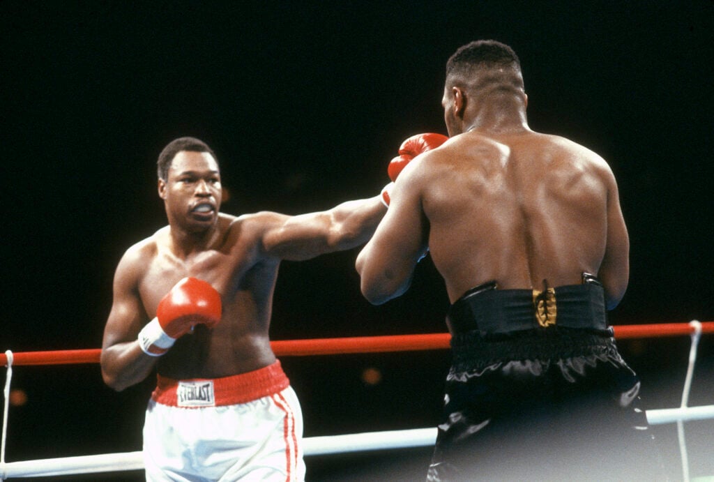 Larry Holmes punching Mike Tyson