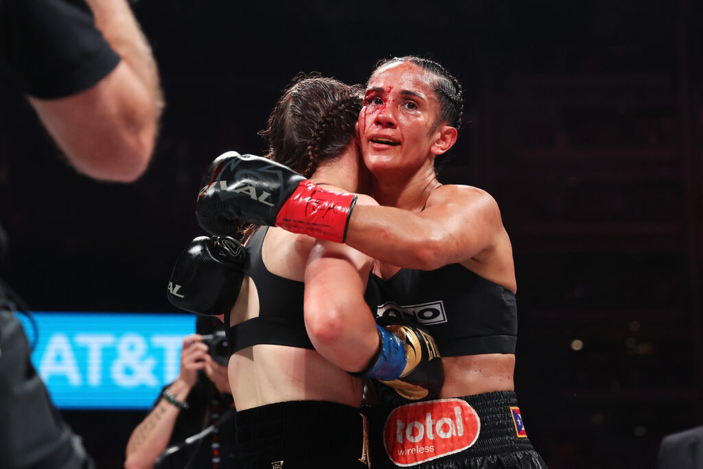 Katie Taylor and Amanda Serrano embrace after their fight