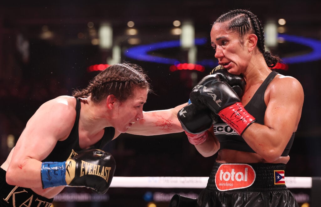 Katie Taylor lands a left jab on Amanda Serrano during their second fight.