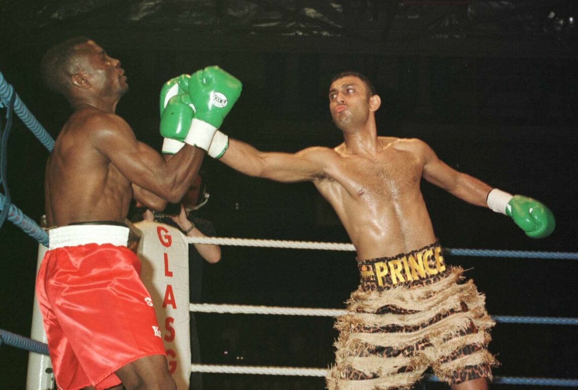 16 Mar 1996:  Prince Naseem Hamed knocks down Said Lawal twice in the first 35 seconds before the referee stops the fight during the Prince Naseem ...