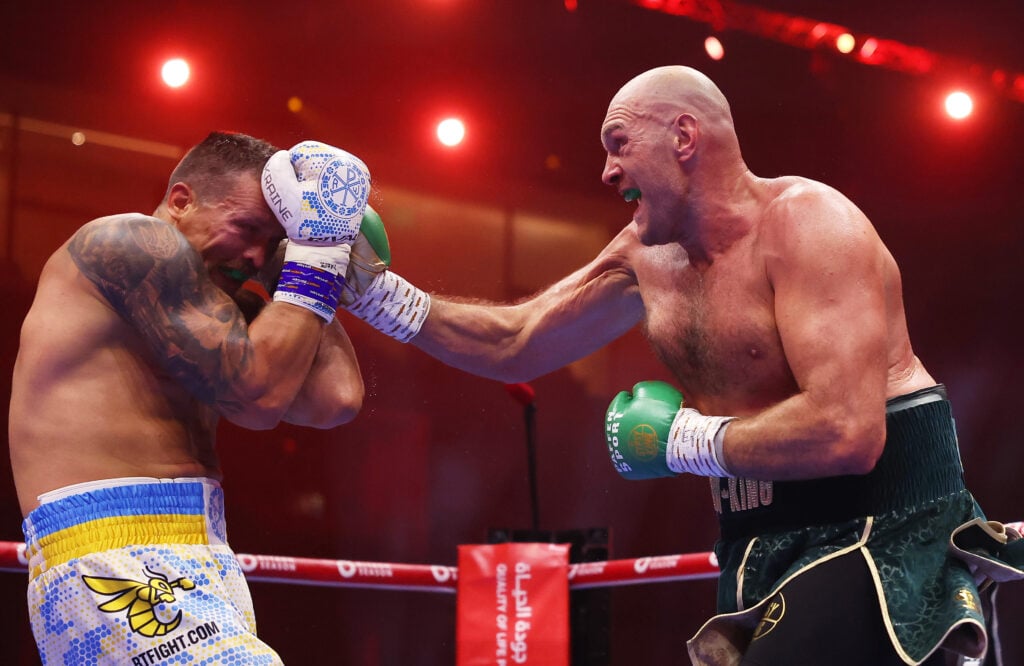 Tyson Fury punching Oleksandr Usyk