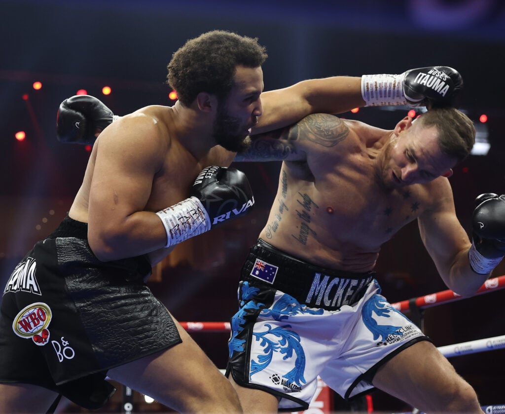Moses Itauma lands a left hook to the head of Demsey McKean