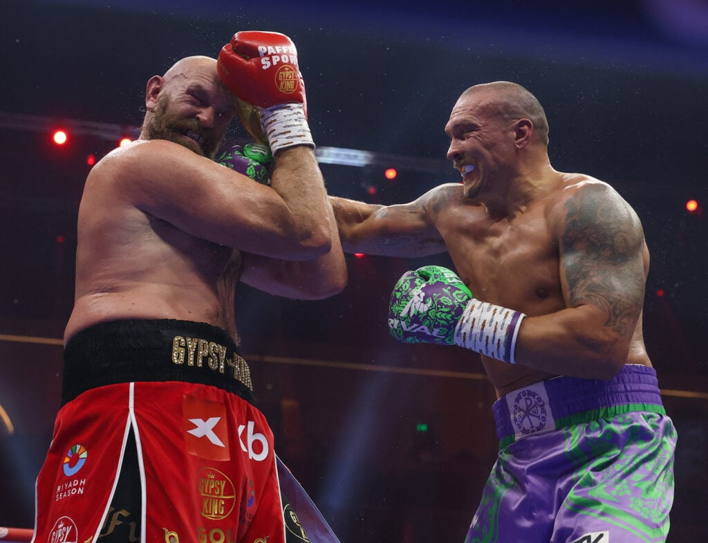 Oleksandr Usyk punches Tyson Fury