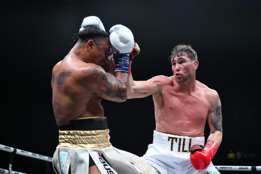 Darren Till punches Anthony Taylor