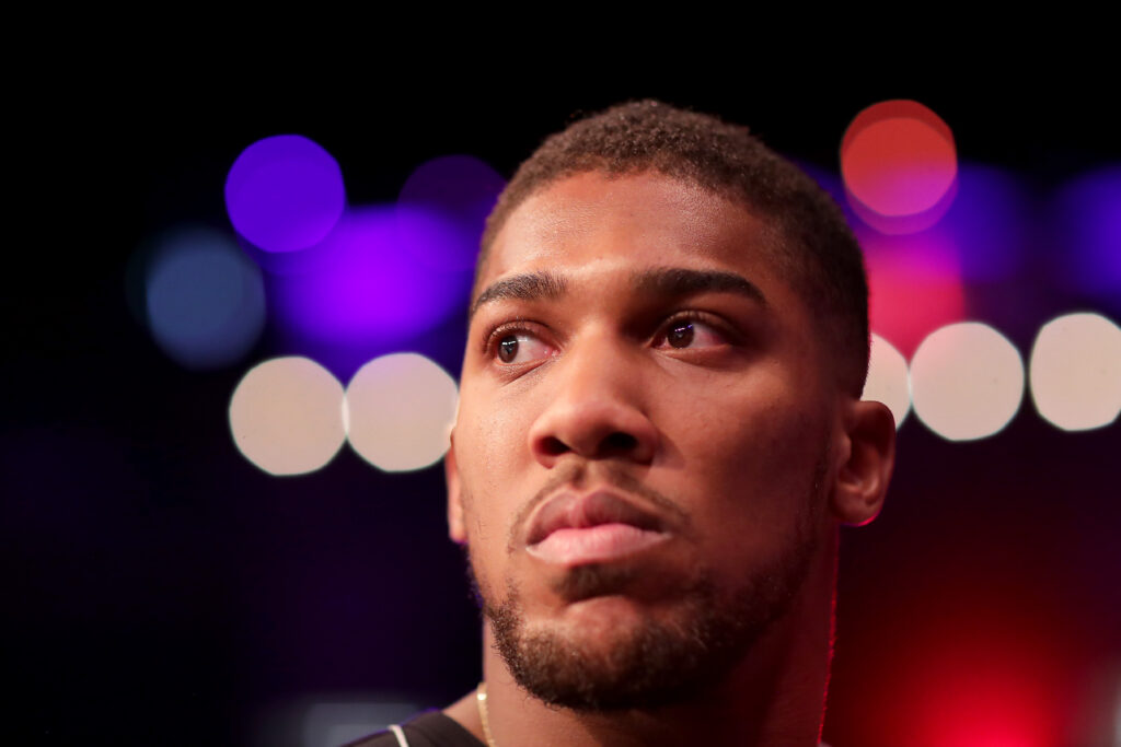 Anthony Joshua looks on