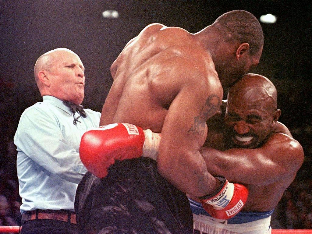 Mike Tyson biting the ear of Evander Holyfield