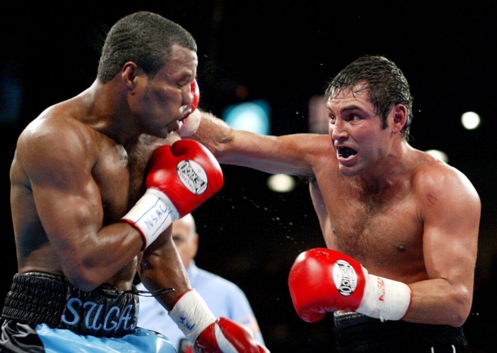 Shane Mosley Defeats Oscar De LaHoya to Claim WBC and WBA 154-Pound Titles