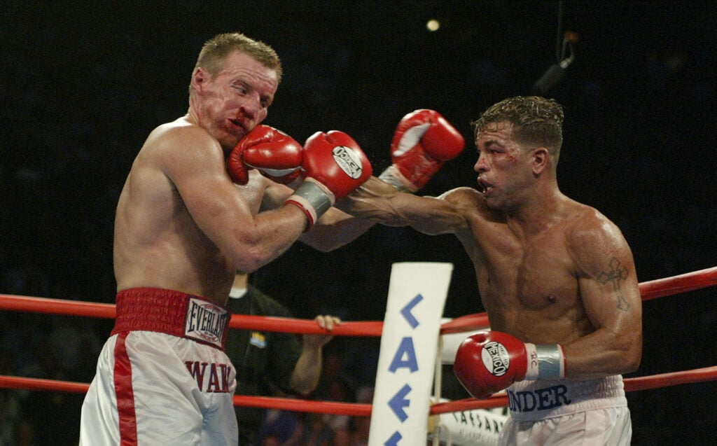 Arturo Gatti lands a punch on Micky Ward