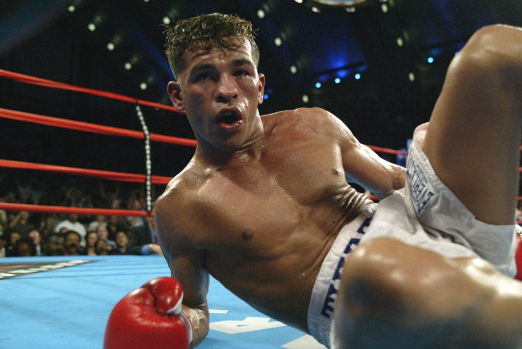 Gatti is knocked down by Micky Ward