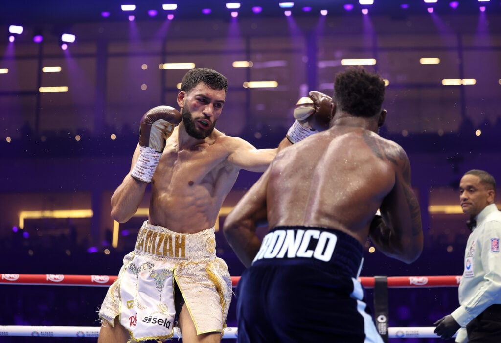 Hamzah Sheeraz throws a left jab at Carlos Adames