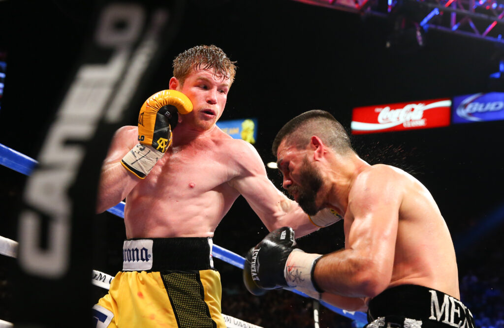 Canelo Alvarez landing punch