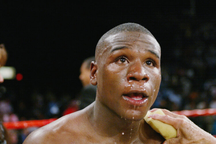 20 Apr 2002 : Floyd Mayweather freshens up between rounds during the WBC Lightweight Championship against Jose Luis Castillo at the MGM Grand Garde...