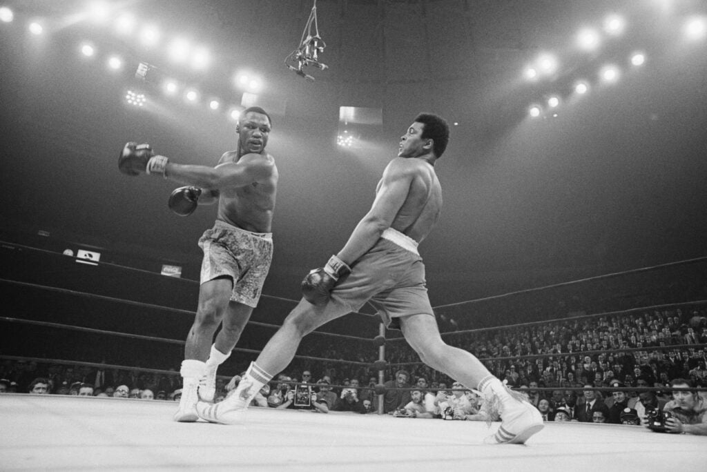 Boxer Ali Dodging a Punch From Frazier