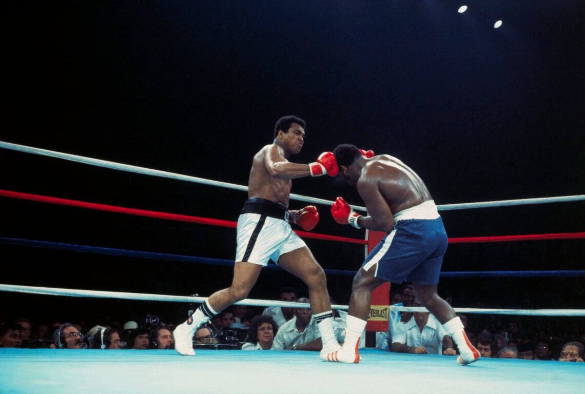 10/1/1975- Manila, The Philippines:  Champion Muhammad Ali (white trunks) lands a right on Joe Frazier's head during the 2nd round.  Ali held his t...