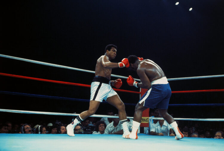 10/1/1975- Manila, The Philippines:  Champion Muhammad Ali (white trunks) lands a right on Joe Frazier's head during the 2nd round.  Ali held his t...