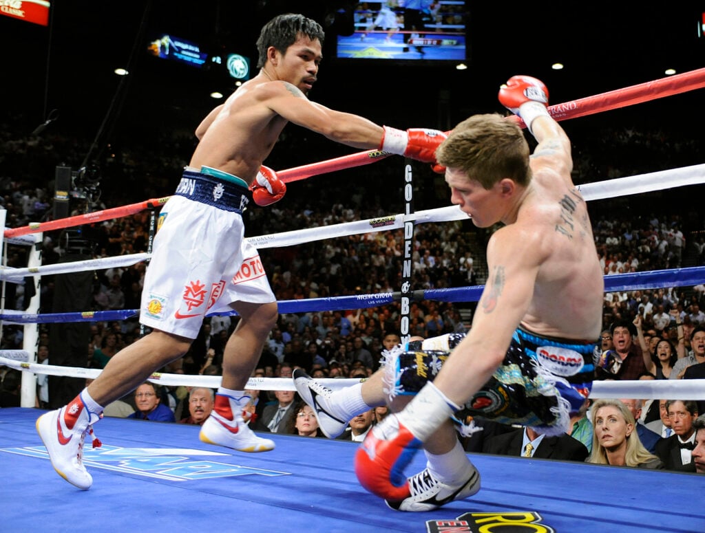 Manny Pacquiao knocks down Ricky Hatton in the 1st round of the Junior Welterweight title fight at