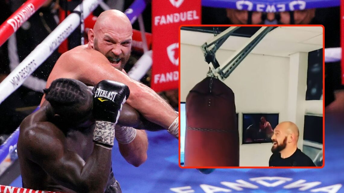 Tyson Fury (top) knocks out Deontay Wilder in the 11th round of their WBC heavyweight title fight at T-Mobile Arena on October 9, 2021 in Las Vegas...