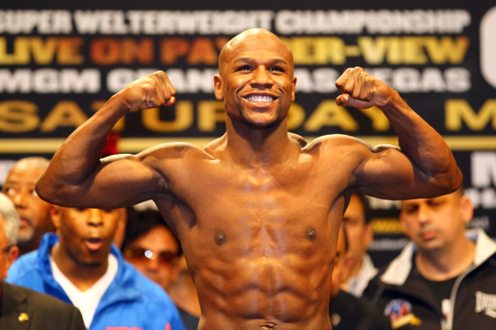 Floyd Mayweather weighs-in to fight Miguel Cotto