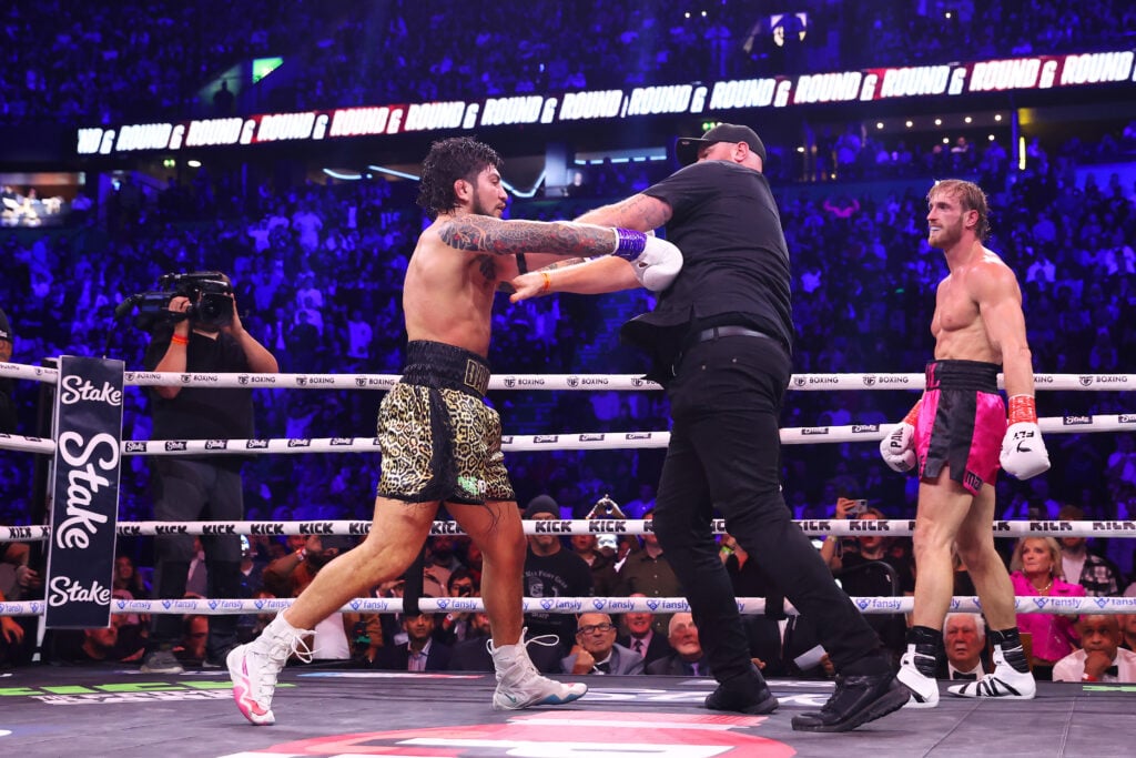 Dillon Danis fights the ref as Logan Paul looks on