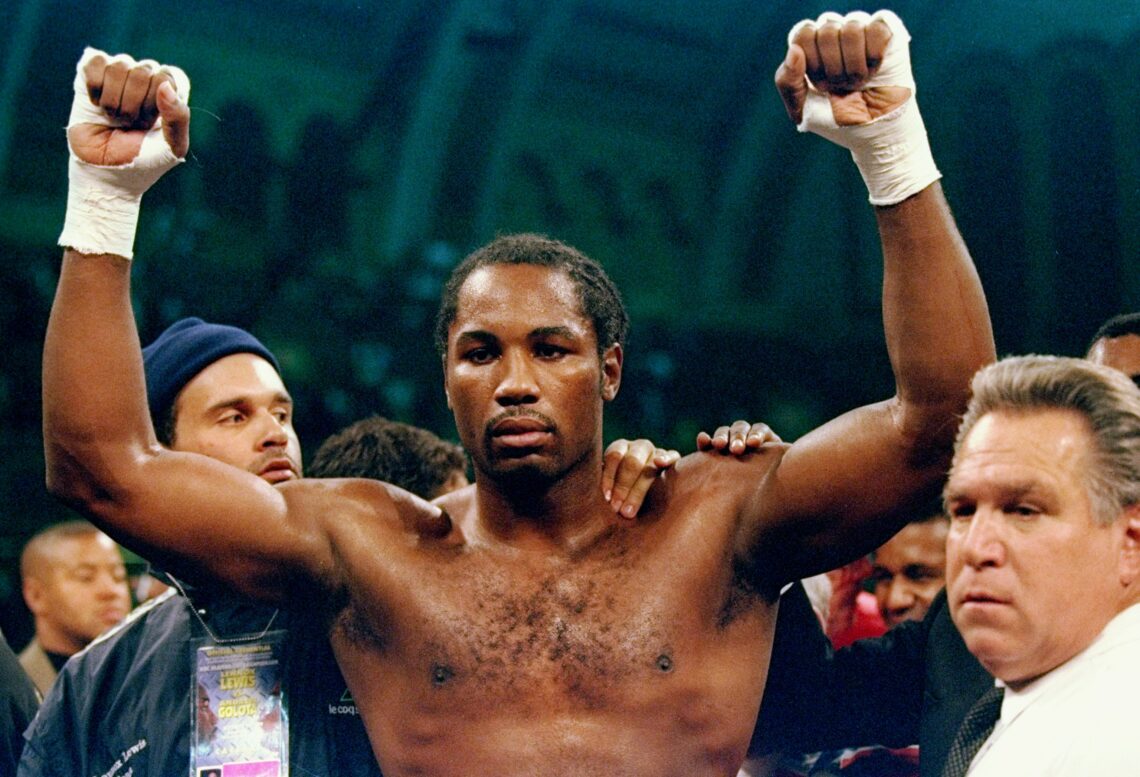 4 Oct 1997:  Lennox Lewis celebrates during a WBC heavyweight championship bout against Andrew Golota at the Atlantic City Convention Center in Atl...