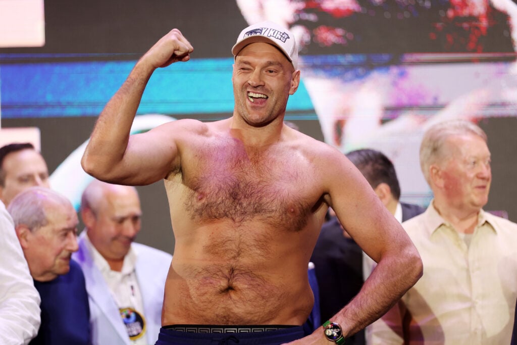 Tyson Fury poses shirtless as he weighs-in to fight Oleksandr Usyk