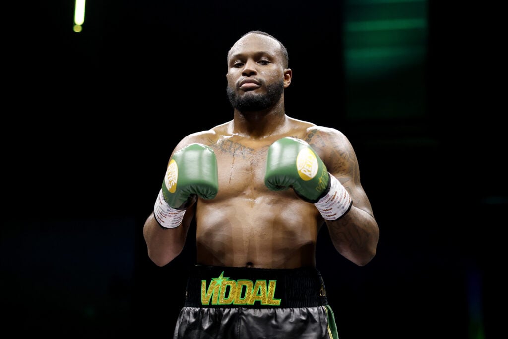 Viddal Riley poses in ring after beating Dan Garber