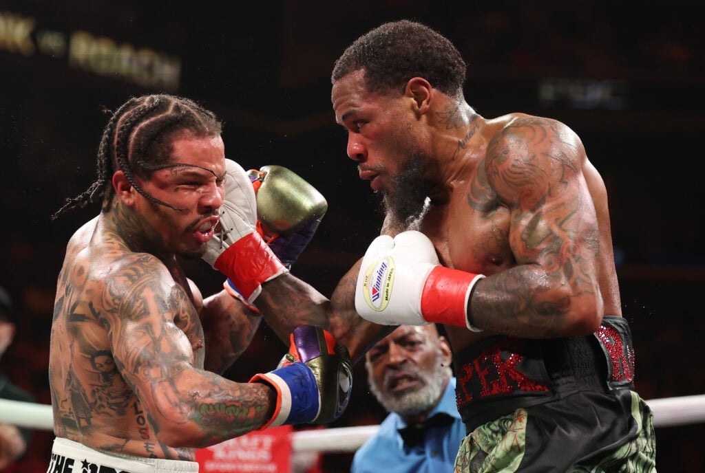 Image of Lamont Roach Jr. punching Gervonta Davis.