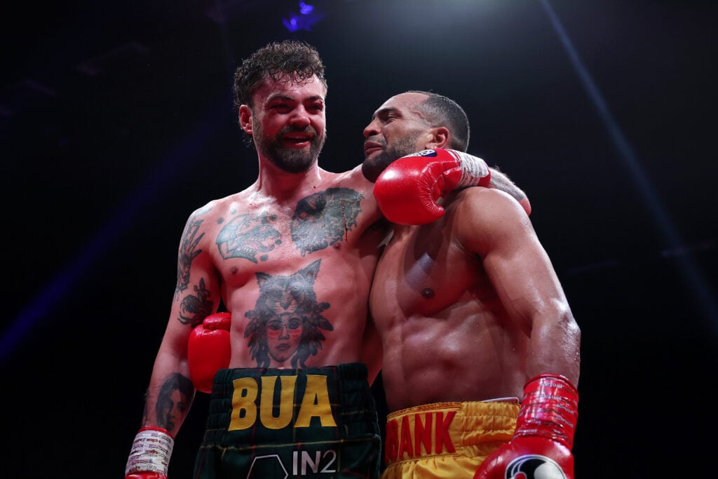 Tyrone McKenna is stood with his arm around Harlem Eubank after their hard fought bout