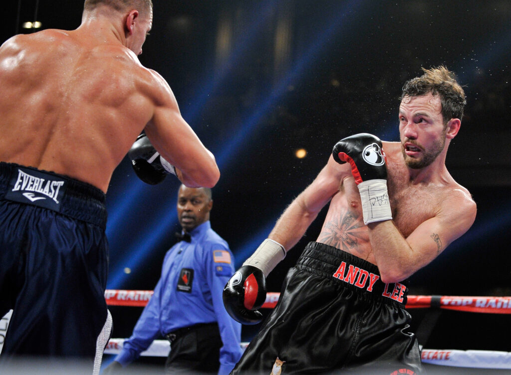 Andy Lee leans back vs Matvey Korobov in 2014