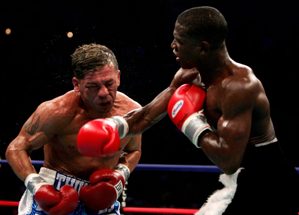 Arturo Gatti receiving punch from Floyd Mayweather, Jr.
