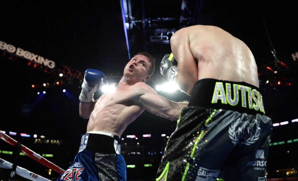 Canelo Alvarez punches Liam Smith