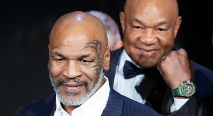 Mike Tyson and George Foreman pose at the 2019 Night of Champions Gala.