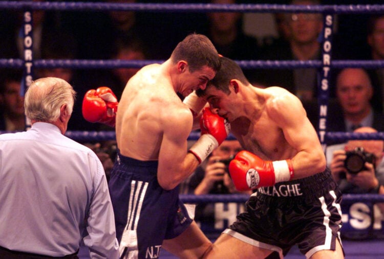 16 Dec 2000: Richie Woodhall lands a right hand punch on Joe Calzaghe during the WBO Super-Middleweight Championship of the world at Sheffield Aren...