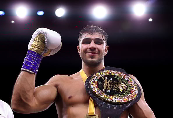 Tommy Fury celebrates defeating Jake Paul