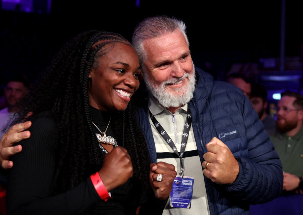 Peter Fury puts his arm around Claressa Shields for a photo