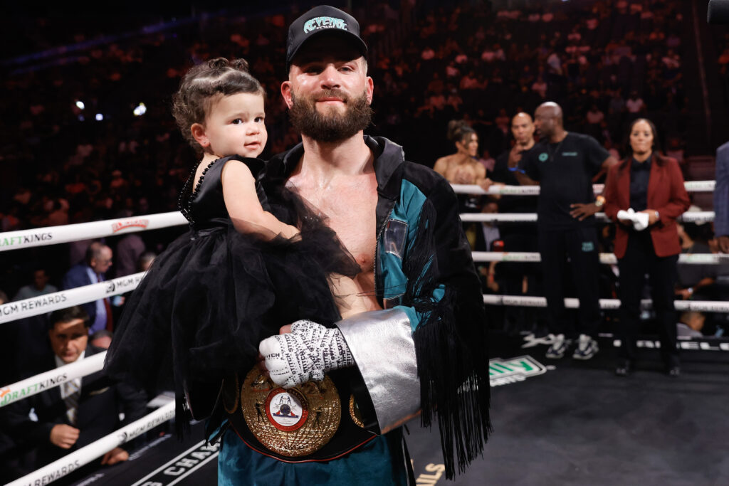 Caleb Plant poses with daughter