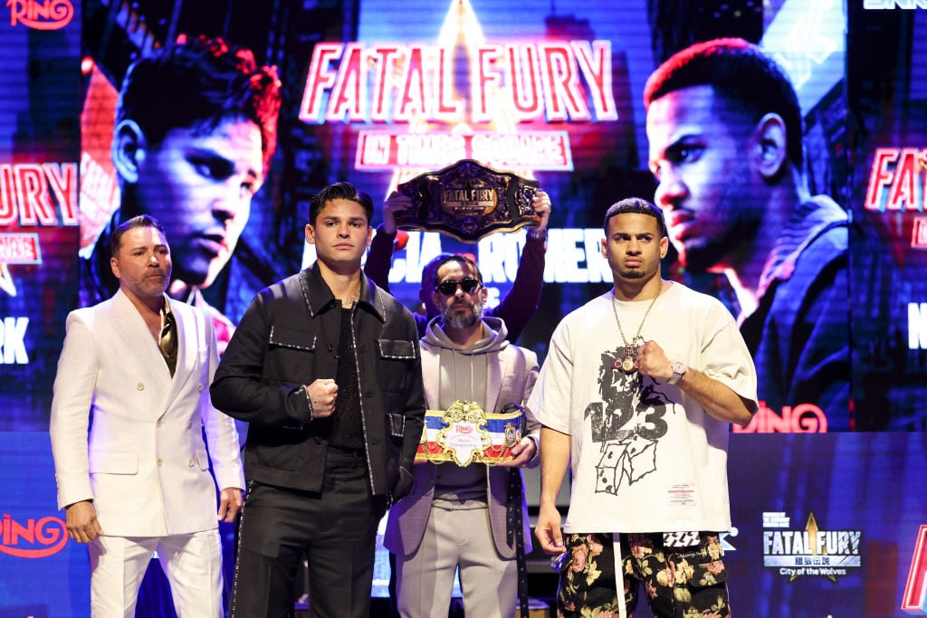 Ryan Garcia stood beside Rolly Romero