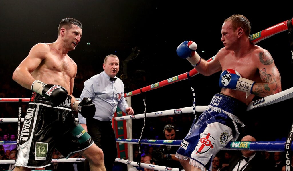 George Groves backed onto the ropes by Carl Froch
