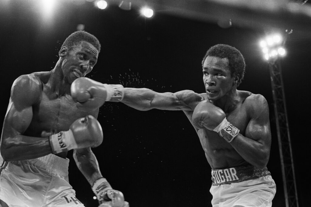 Sugar Ray Leonard Jabbing Tommy Hearns