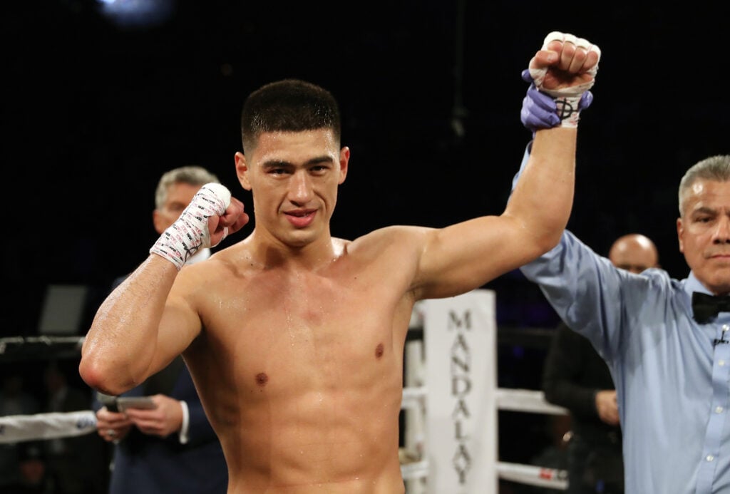 Dmitry Bivol gets hand raised in victory