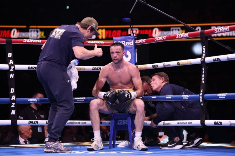 Josh Taylor on the stool between rounds looking forlorn