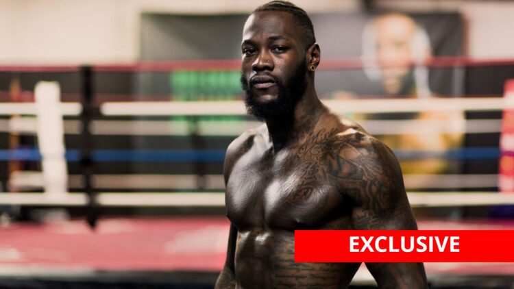 Deontay Wilder during a photoshoot with exclusive banner