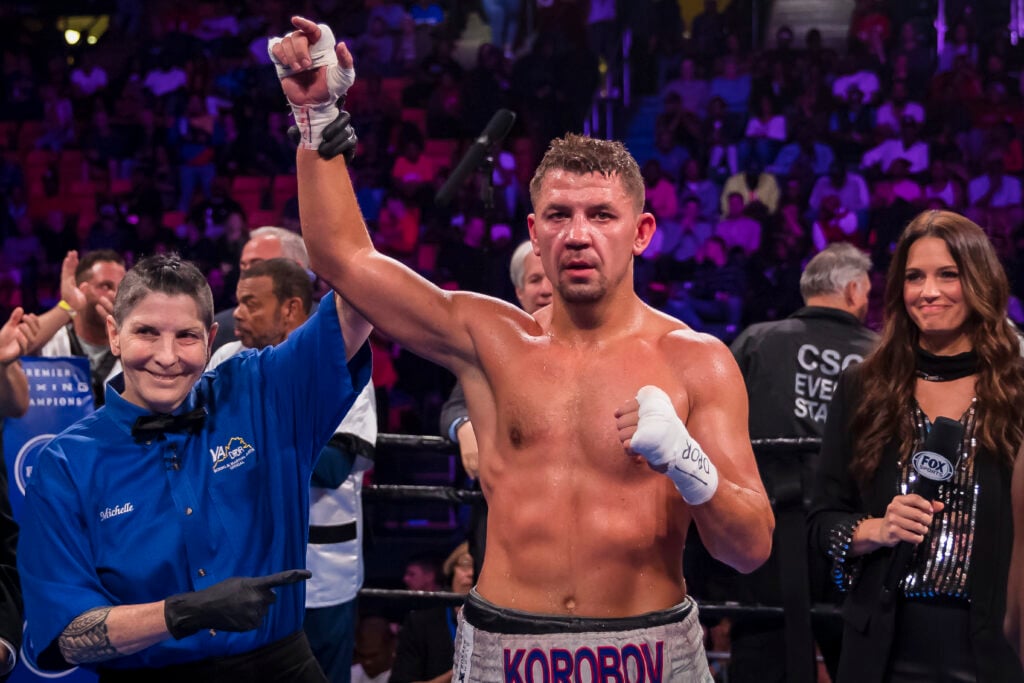 Matvey Korobov has his hand raised after beating Immanuwel Aleem.