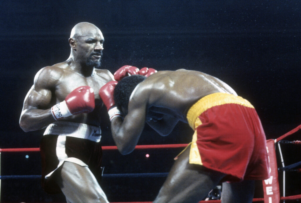 Marvin Hagler preparing to punch Wilford Scypion