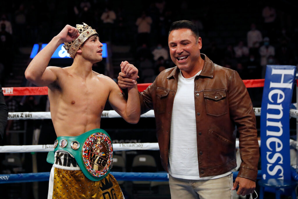 Ryan Garcia and Oscar De La Hoya celebrate Garcia's win over Luke Campbell