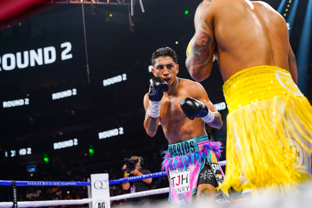 Mario Barrios facing Gervonta Davis in ring