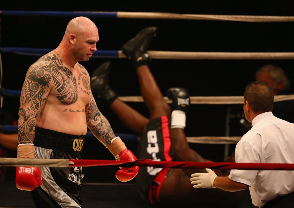 Lucas Browne walks away as James Toney falls to the canvas